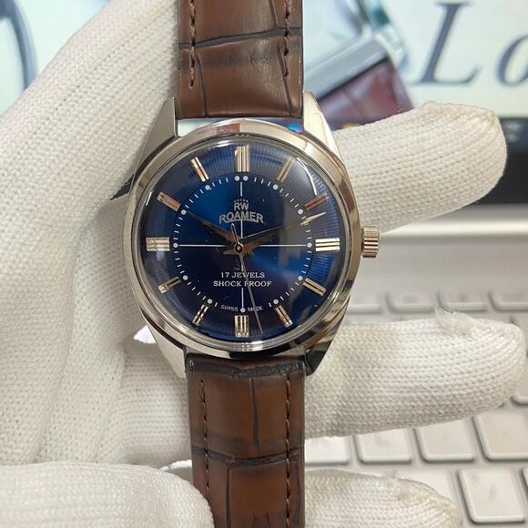 Vintage 1979 Roamer Manual Mens Silver Watch W/Leather Strap & Blue accents - Picture 1 of 7